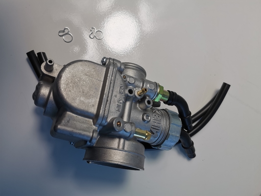 Carburateur de zinc adapté aux pièces de moteur de motocyclette PE24