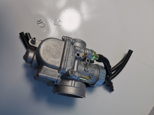 Carburateur de zinc adapté aux pièces de moteur de motocyclette PE24