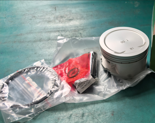 Pistons et kit de pistons de moteur de moto de haute qualité avec un diamètre d'alésage de 52,4 mm, une résistance à l'usure et une résistance à la chaleur